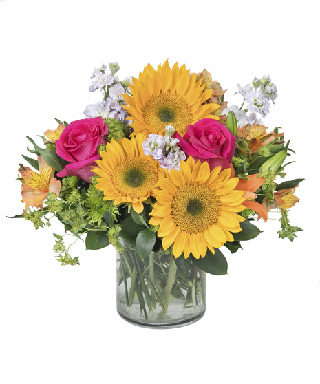 Bright flower arrangement in cylinder vase in Boston, MA
